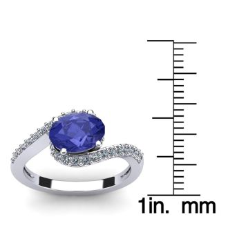 1 1/2 Carat Oval Shape Tanzanite and Halo Diamond Ring In 14 Karat White Gold