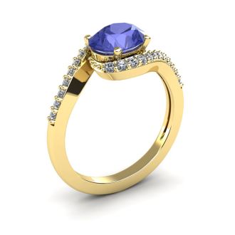 1 1/2 Carat Oval Shape Tanzanite and Halo Diamond Ring In 14 Karat Yellow Gold