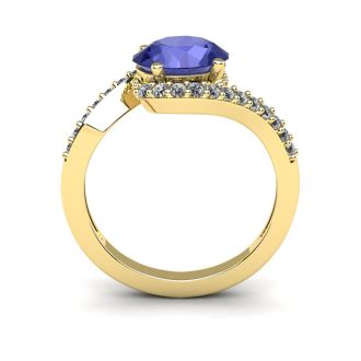 1 1/2 Carat Oval Shape Tanzanite and Halo Diamond Ring In 14 Karat Yellow Gold