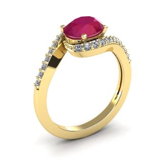 1 3/4 Carat Oval Shape Ruby and Halo Diamond Ring In 14 Karat Yellow Gold