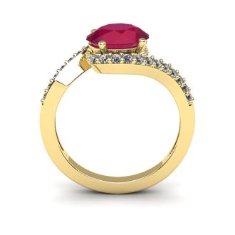 1 3/4 Carat Oval Shape Ruby and Halo Diamond Ring In 14 Karat Yellow Gold