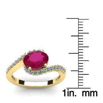 1 3/4 Carat Oval Shape Ruby and Halo Diamond Ring In 14 Karat Yellow Gold