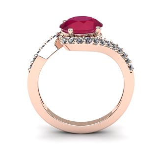 1 3/4 Carat Oval Shape Ruby and Halo Diamond Ring In 14 Karat Rose Gold