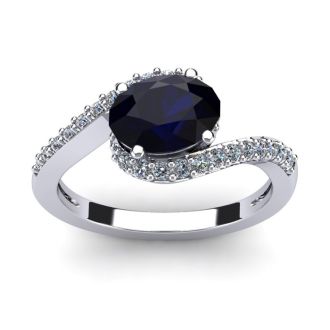 1 3/4 Carat Oval Shape Sapphire and Halo Diamond Ring In 14 Karat White Gold