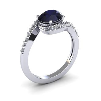 1 3/4 Carat Oval Shape Sapphire and Halo Diamond Ring In 14 Karat White Gold