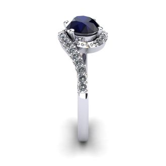 1 3/4 Carat Oval Shape Sapphire and Halo Diamond Ring In 14 Karat White Gold