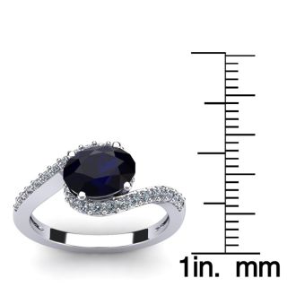 1 3/4 Carat Oval Shape Sapphire and Halo Diamond Ring In 14 Karat White Gold