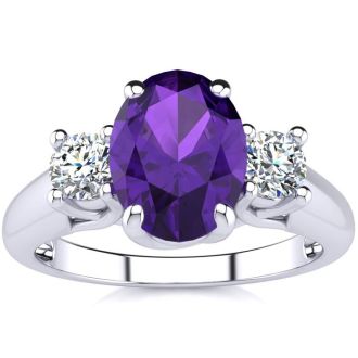 1 1/4 Carat Oval Shape Amethyst and Two Diamond Ring In 14 Karat White Gold