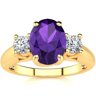 1 1/4 Carat Oval Shape Amethyst and Two Diamond Ring In 14 Karat Yellow Gold