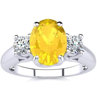 1 1/4 Carat Oval Shape Citrine and Two Diamond Ring In 14 Karat White Gold