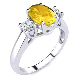 1 1/4 Carat Oval Shape Citrine and Two Diamond Ring In 14 Karat White Gold
