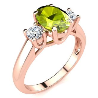 1 1/2 Carat Oval Shape Peridot and Two Diamond Ring In 14 Karat Rose Gold