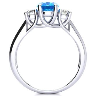 1 3/4 Carat Oval Shape Blue Topaz and Two Diamond Ring In 14 Karat White Gold