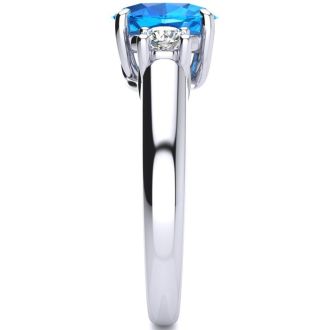1 3/4 Carat Oval Shape Blue Topaz and Two Diamond Ring In 14 Karat White Gold