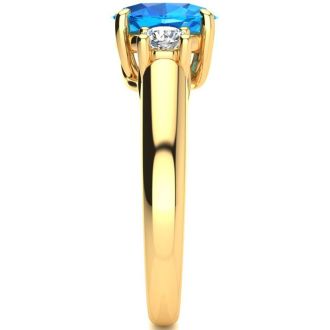 1 3/4 Carat Oval Shape Blue Topaz and Two Diamond Ring In 14 Karat Yellow Gold