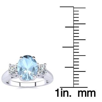Aquamarine Ring: Aquamarine Jewelry: 1 1/3 Carat Oval Shape Aquamarine and Two Diamond Ring In 14 Karat White Gold