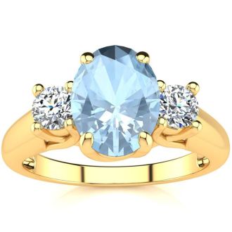 Aquamarine Ring: Aquamarine Jewelry: 1 1/3 Carat Oval Shape Aquamarine and Two Diamond Ring In 14 Karat Yellow Gold