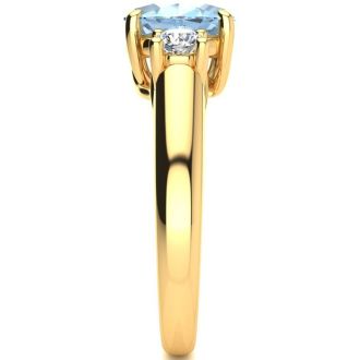 Aquamarine Ring: Aquamarine Jewelry: 1 1/3 Carat Oval Shape Aquamarine and Two Diamond Ring In 14 Karat Yellow Gold