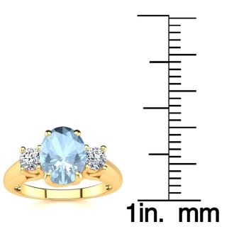 Aquamarine Ring: Aquamarine Jewelry: 1 1/3 Carat Oval Shape Aquamarine and Two Diamond Ring In 14 Karat Yellow Gold