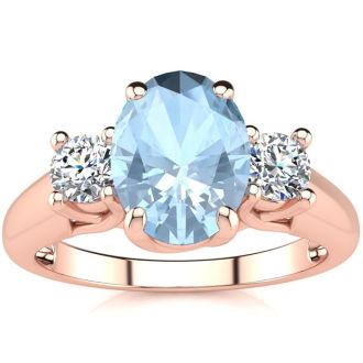 Aquamarine Ring: Aquamarine Jewelry: 1 1/3 Carat Oval Shape Aquamarine and Two Diamond Ring In 14 Karat Rose Gold