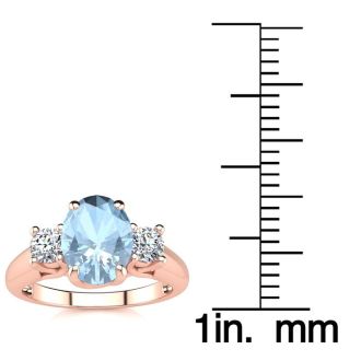 Aquamarine Ring: Aquamarine Jewelry: 1 1/3 Carat Oval Shape Aquamarine and Two Diamond Ring In 14 Karat Rose Gold