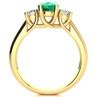 1 1/3 Carat Oval Shape Emerald and Two Diamond Ring In 14 Karat Yellow Gold
