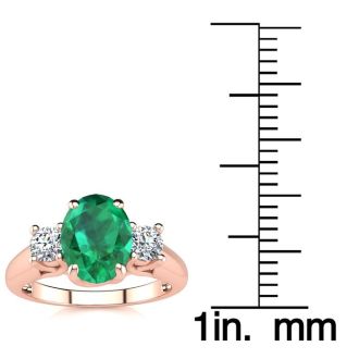 1 1/3 Carat Oval Shape Emerald and Two Diamond Ring In 14 Karat Rose Gold