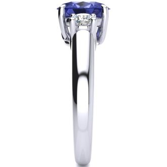 1 1/2 Carat Oval Shape Tanzanite and Two Diamond Ring In 14 Karat White Gold