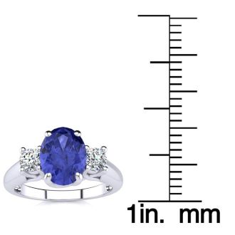 1 1/2 Carat Oval Shape Tanzanite and Two Diamond Ring In 14 Karat White Gold