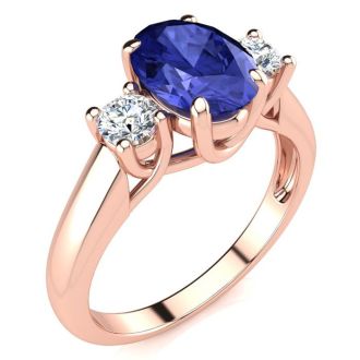 1 1/2 Carat Oval Shape Tanzanite and Two Diamond Ring In 14 Karat Rose Gold