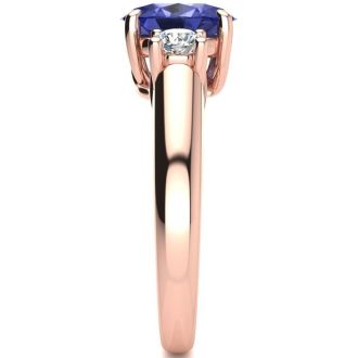 1 1/2 Carat Oval Shape Tanzanite and Two Diamond Ring In 14 Karat Rose Gold