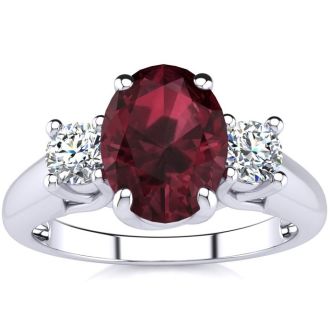 Garnet Ring: Garnet Jewelry: 1 3/4 Carat Oval Shape Garnet and Two Diamond Ring In 14 Karat White Gold