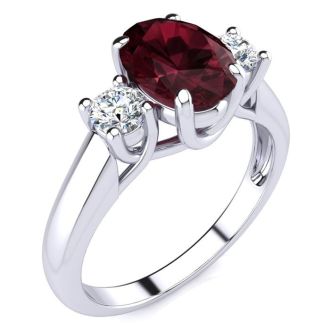 Garnet Ring: Garnet Jewelry: 1 3/4 Carat Oval Shape Garnet and Two Diamond Ring In 14 Karat White Gold