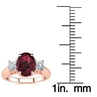 Garnet Ring: Garnet Jewelry: 1 3/4 Carat Oval Shape Garnet and Two Diamond Ring In 14 Karat Rose Gold
