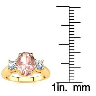 1-1/3 Carat Oval Shape Morganite and Two Diamond Ring In 14 Karat Yellow Gold