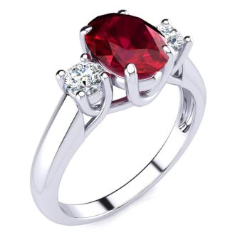 1 3/4 Carat Oval Shape Ruby and Two Diamond Ring In 14 Karat White Gold