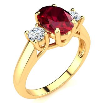 1 3/4 Carat Oval Shape Ruby and Two Diamond Ring In 14 Karat Yellow Gold
