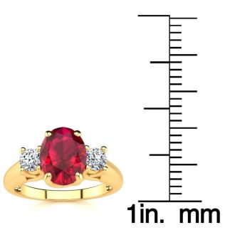 1 3/4 Carat Oval Shape Ruby and Two Diamond Ring In 14 Karat Yellow Gold