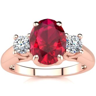 1 3/4 Carat Oval Shape Ruby and Two Diamond Ring In 14 Karat Rose Gold