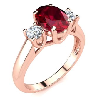 1 3/4 Carat Oval Shape Ruby and Two Diamond Ring In 14 Karat Rose Gold