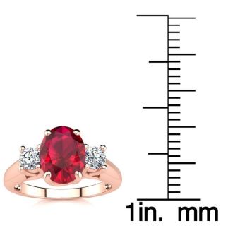 1 3/4 Carat Oval Shape Ruby and Two Diamond Ring In 14 Karat Rose Gold