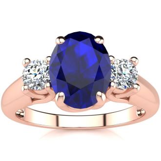 1 3/4 Carat Oval Shape Sapphire and Two Diamond Ring In 14 Karat Rose Gold