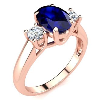 1 3/4 Carat Oval Shape Sapphire and Two Diamond Ring In 14 Karat Rose Gold