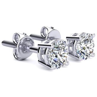 1 Carat Natural, Colorless Diamond Stud Earrings In 14 Karat White Gold.  These Diamond Are Not Enhanced In Any Way!