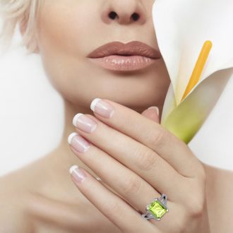 4 Carat Peridot and Halo Diamond Ring In 14 Karat White Gold
