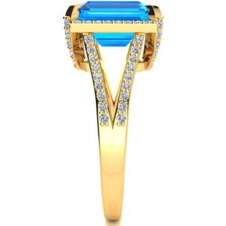 4 Carat Blue Topaz and Halo Diamond Ring In 14 Karat Yellow Gold
