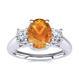 1 Carat Oval Shape Citrine and Two Diamond Ring In 14 Karat White Gold