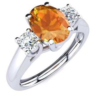 1 Carat Oval Shape Citrine and Two Diamond Ring In 14 Karat White Gold