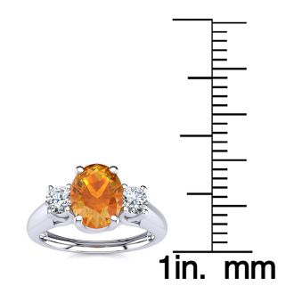 1 Carat Oval Shape Citrine and Two Diamond Ring In 14 Karat White Gold