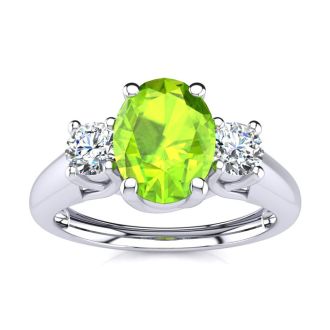 1 Carat Oval Shape Peridot and Two Diamond Ring In 14 Karat White Gold